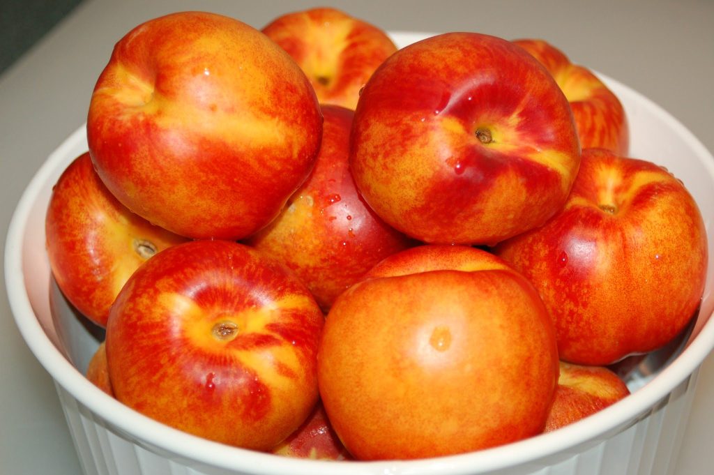 fresh peaches in bowl