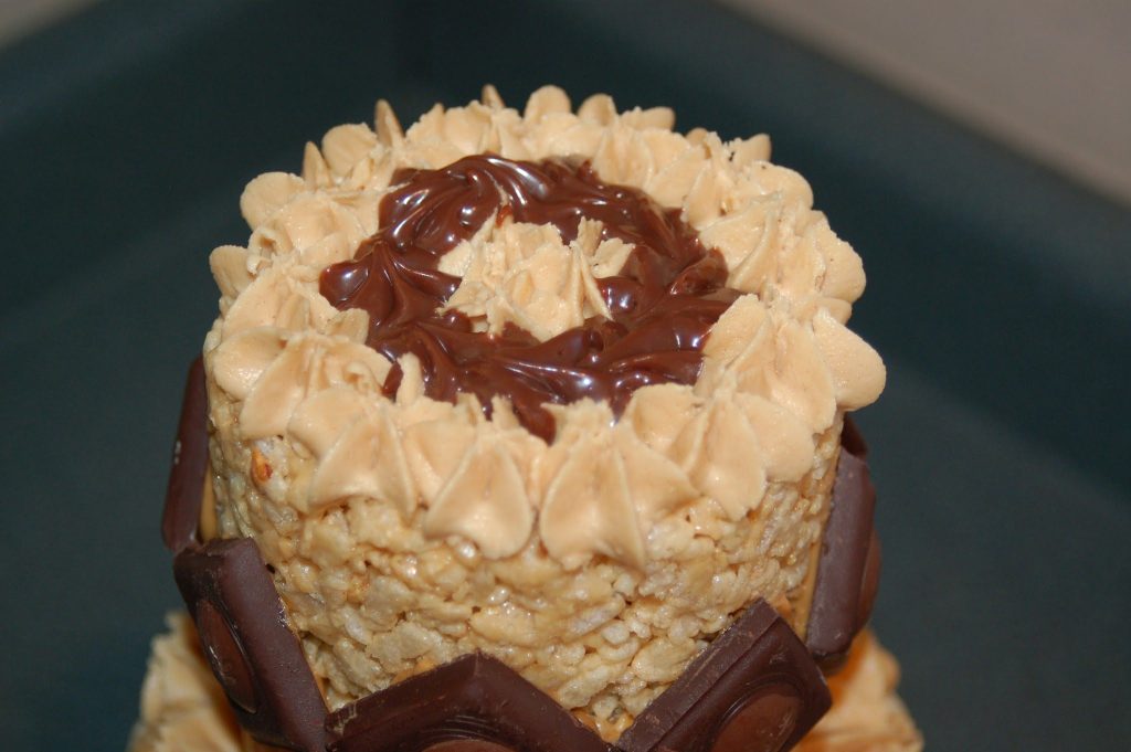 top tier of a peanut butter rice krispies cake