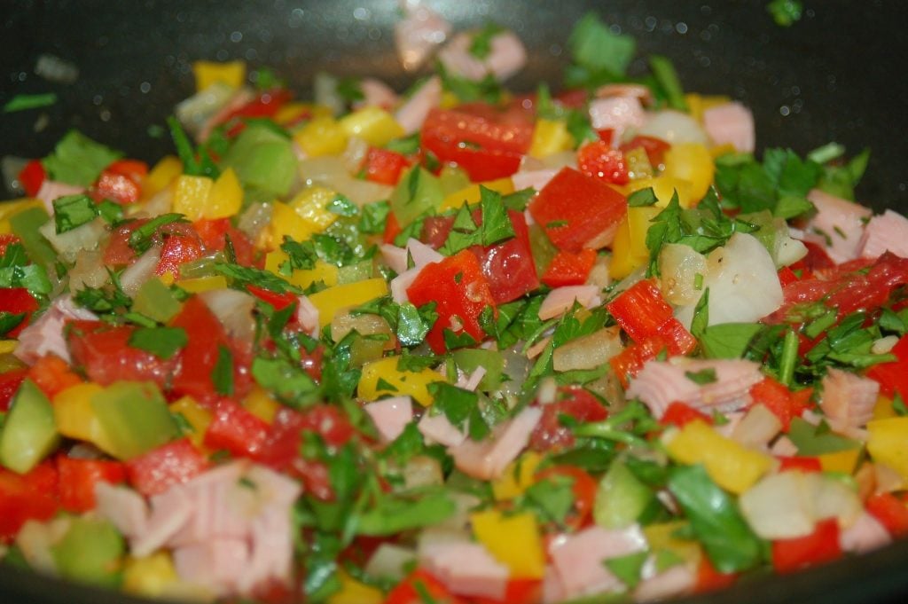 chopped red peppers, onions and cilantro close up