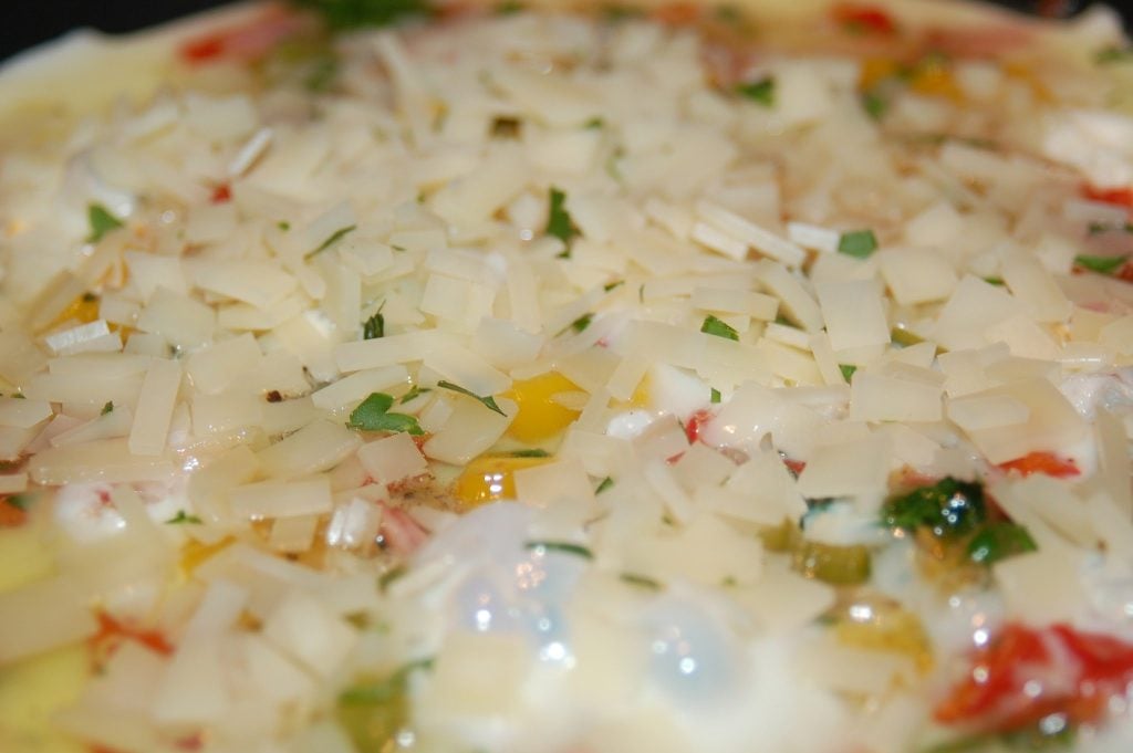 extreme close up of egg whites cooking