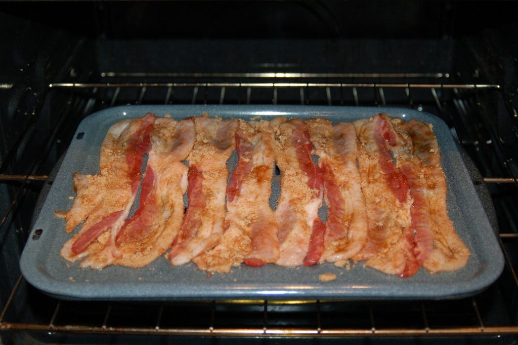 strips of brown sugar bacon under oven broiler