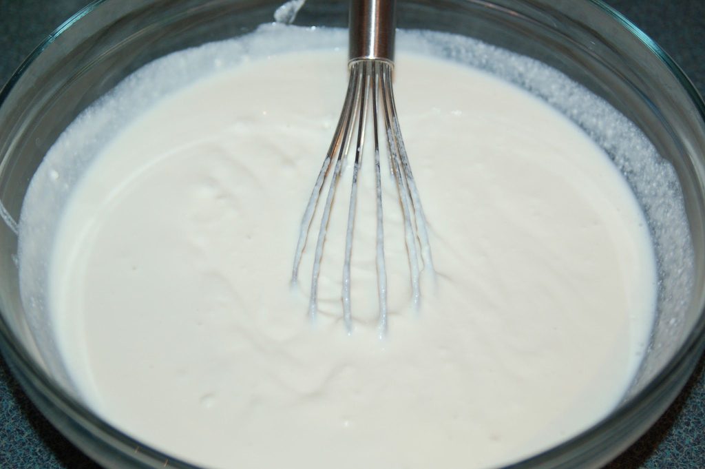 whisking cream and ricotta together for cannoli ice cream base