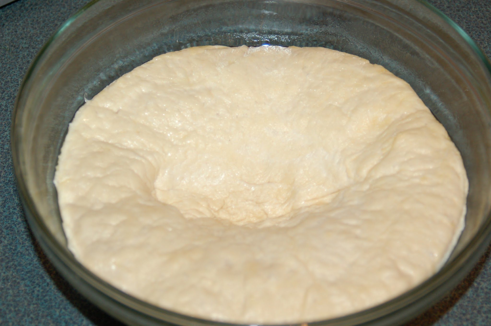 pizza dough in pan