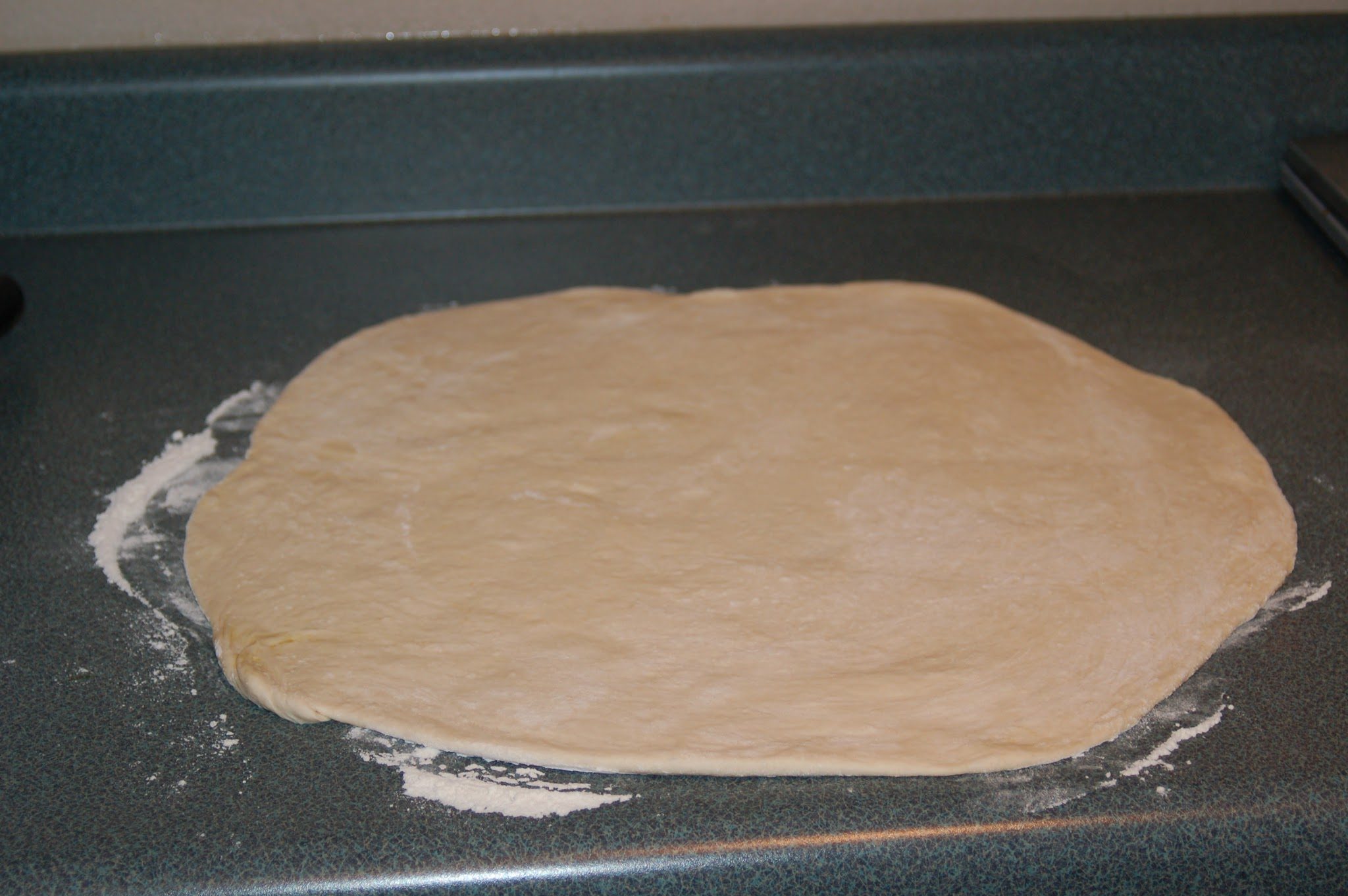 unbaked pizza crust