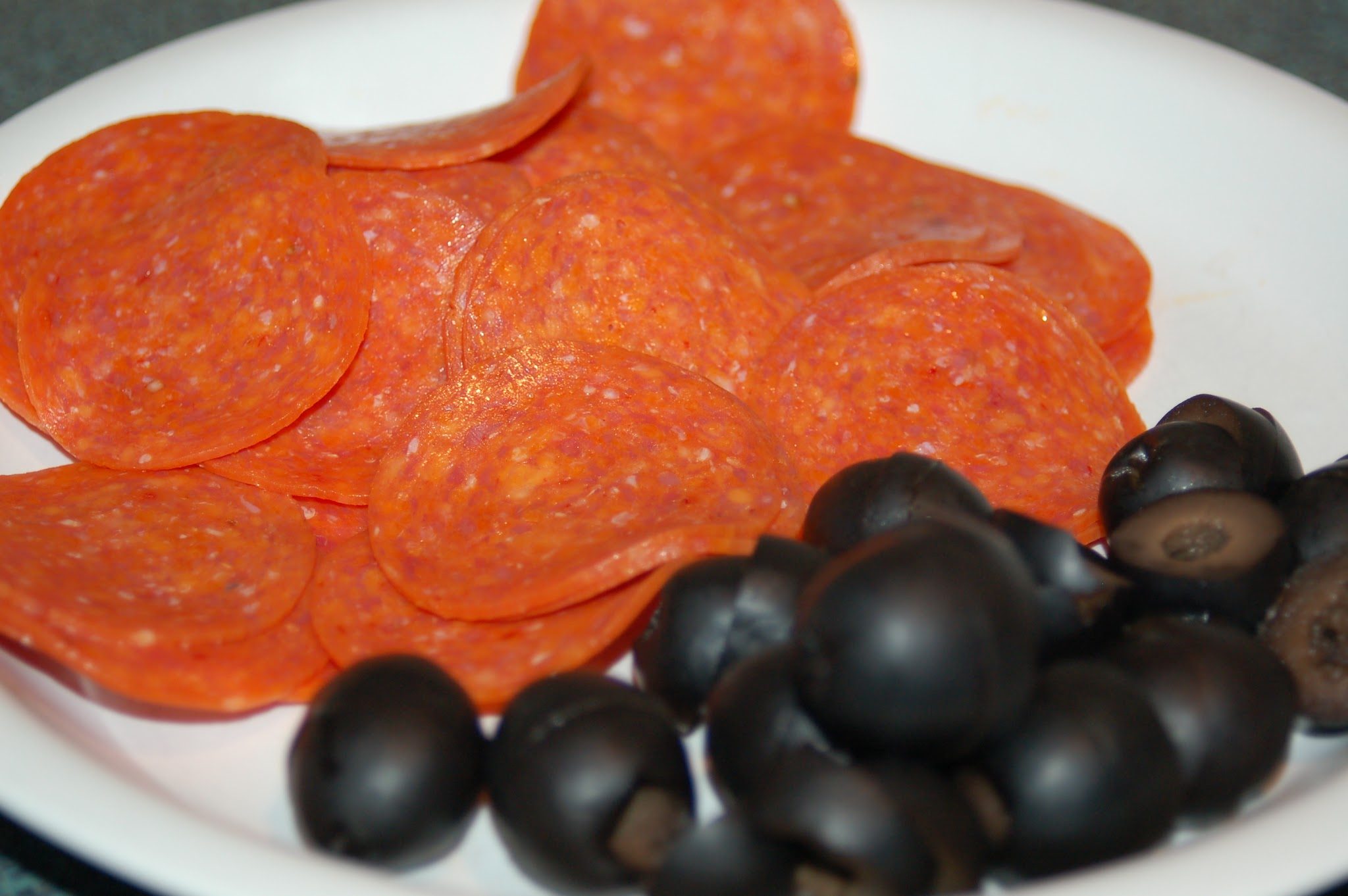 pepperoni slices and black olives