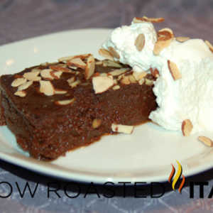 chocolate sformato on plate with whipped cream