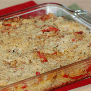 baked sausage with orzo in baking dish