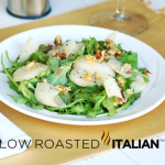 pear and arugala salad on plate