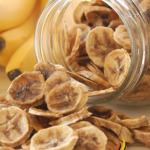 dried banana coins in tipped over jar