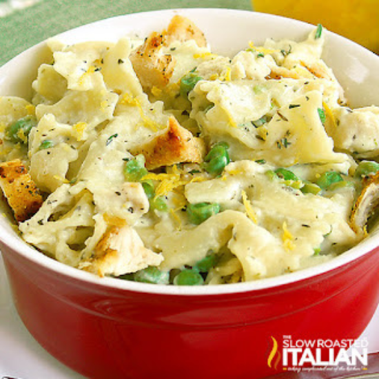 bowl of cheesy chicken pasta with peas