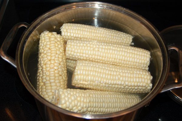 soaking ears of corn for roasted corn recipe