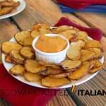 grilled potato chip slices on plate with dip