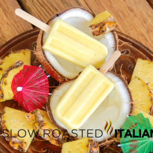 virgin pina colada ice pops on a sliced coconut