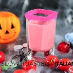 pink bubble gum cocktail in a shot glass