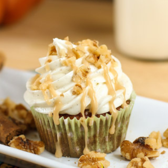 apple cupcake with frosting and caramel drizzle