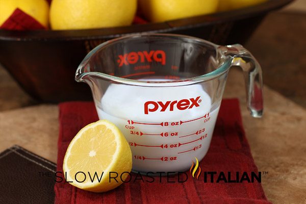 buttermilk substitute in glass measuring cup
