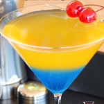 blue polka dot martini in glass