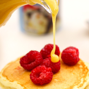 orange amaretto syrup drizzled on pancakes