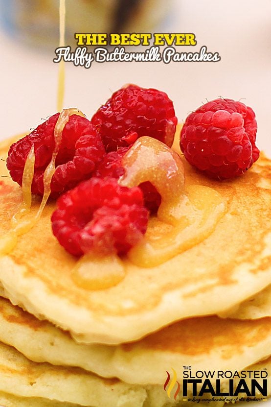 stack of buttermilk pancakes with fresh raspberries