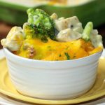 cheesy chicken and broccoli in white bowl