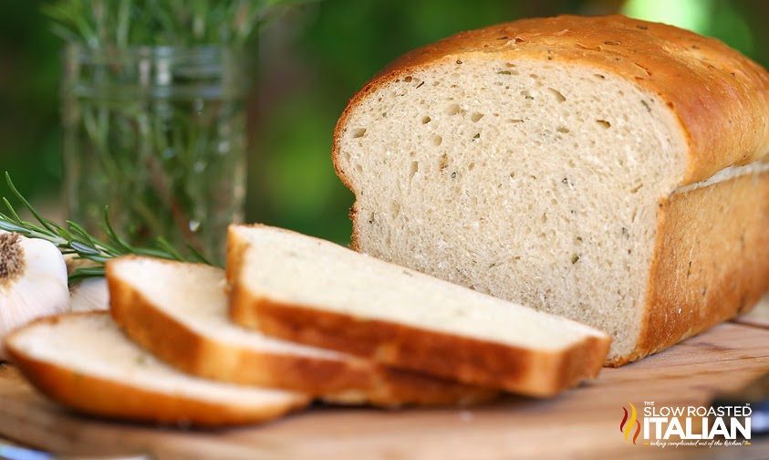 homemade garlic herb bread, cut into slices.