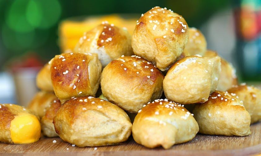 soft pretzel dogs in a pile.