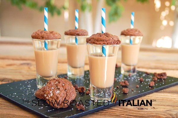 chocolate caramel shooter with straw and cookie on top