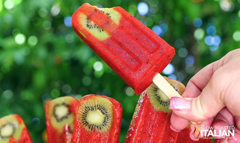 vitamin c popsicles, one with bite taken out