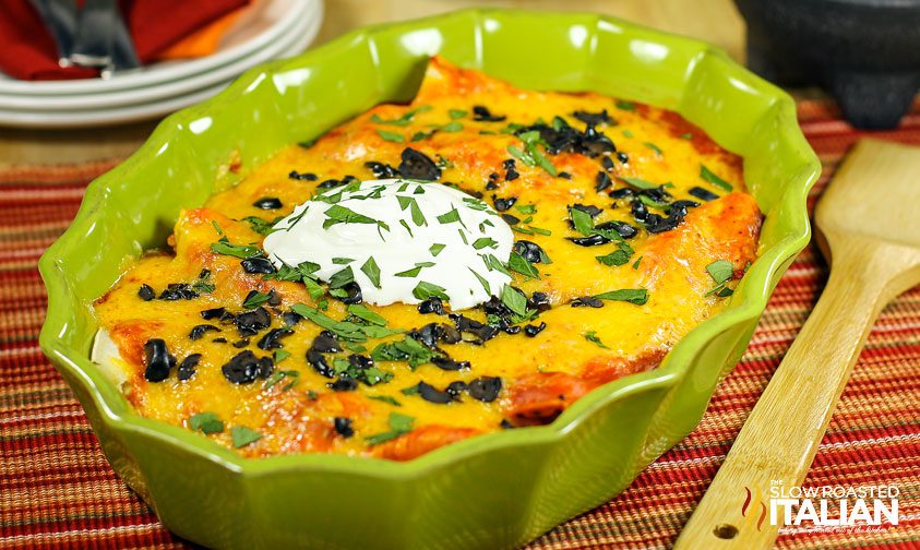 cheesy beef enchiladas in casserole dish