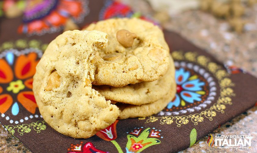 stack of homemade caramel butterscotch cookies, one with bite taken out