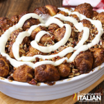 cinnamon pecan pull apart bread in white dish