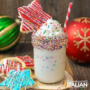 Cup of Extreme Sprinkle Sugar Cookie Milkshake with Red and White Straw
