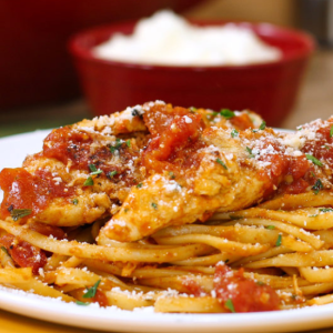 plate of chicken parmesan pasta toss