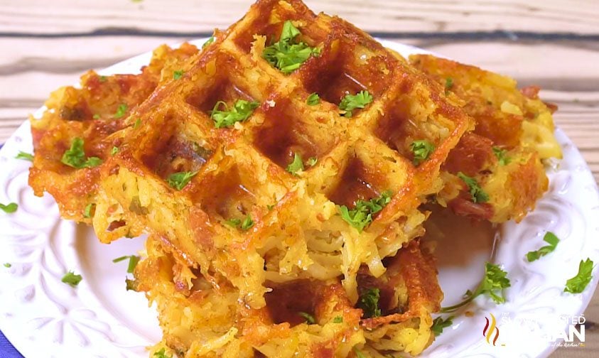 cheesy bacon hashbrown waffles on plate