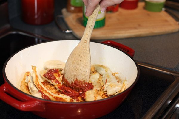making quick chicken parmesan on stove top