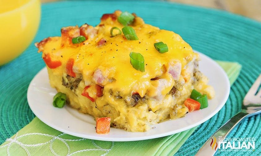 plate of overnight breakfast casserole with biscuits