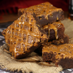 stack of salted caramel fudge brownies