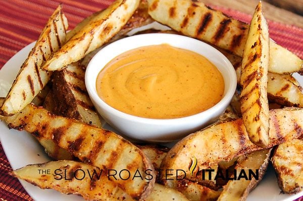 homemade fries surrounding smoky beer cheese sauce in bowl