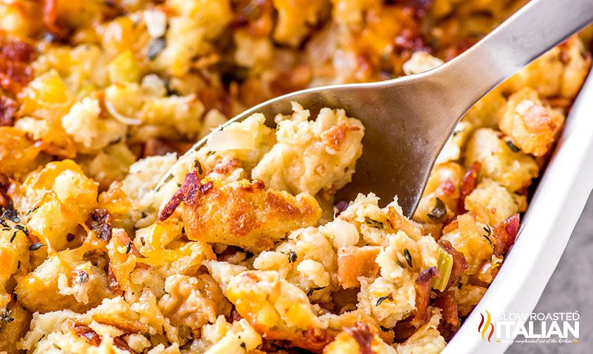 spoon in serving dish of beer cheese stuffing