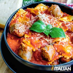 sausage and ravioli in a bowl