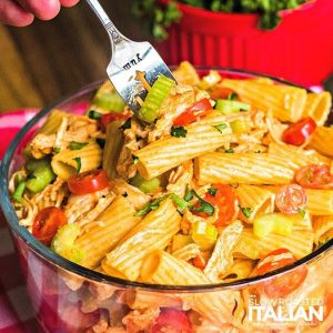 fork in bowl of rigatoni pasta salad