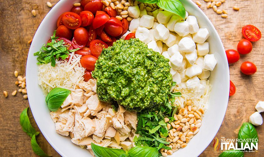 pesto pasta salad ingredients in bowl