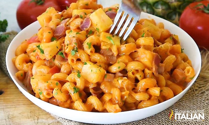 fork digging into bowl of hawaiian pasta dinner