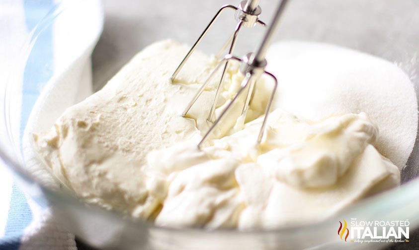 mixing cheesecake topping