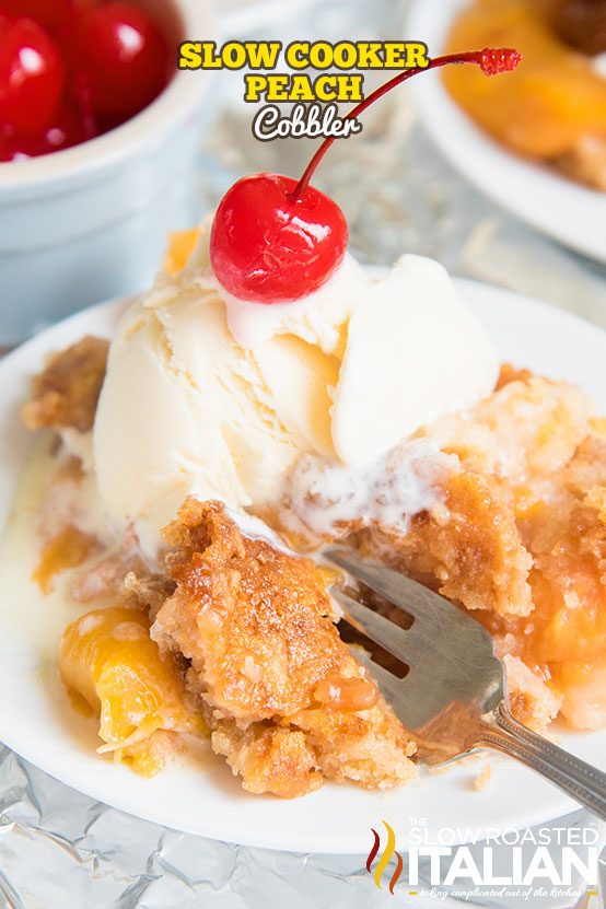 slow cooker cobbler on dessert plate with fork