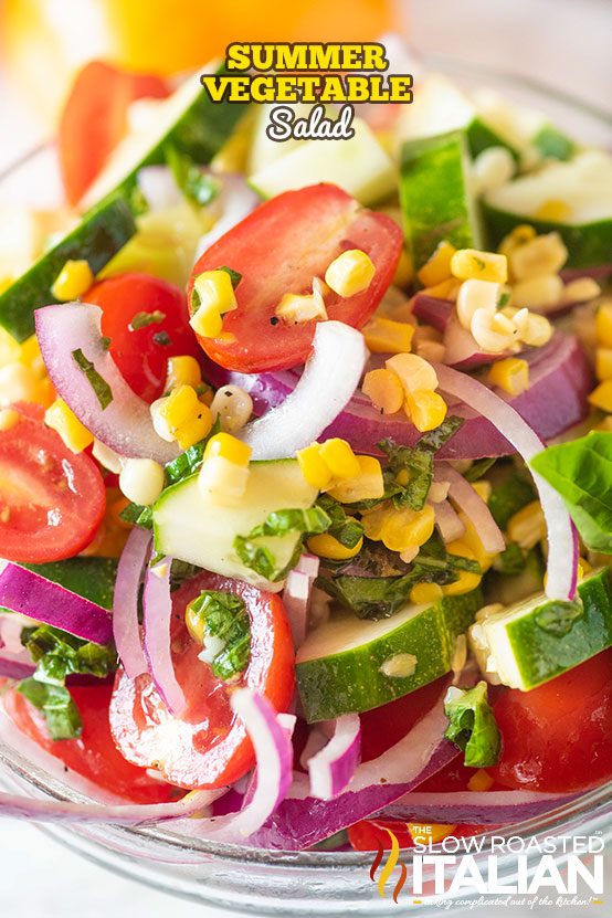 titled (shown in glass bowl) summer vegetable salad recipe