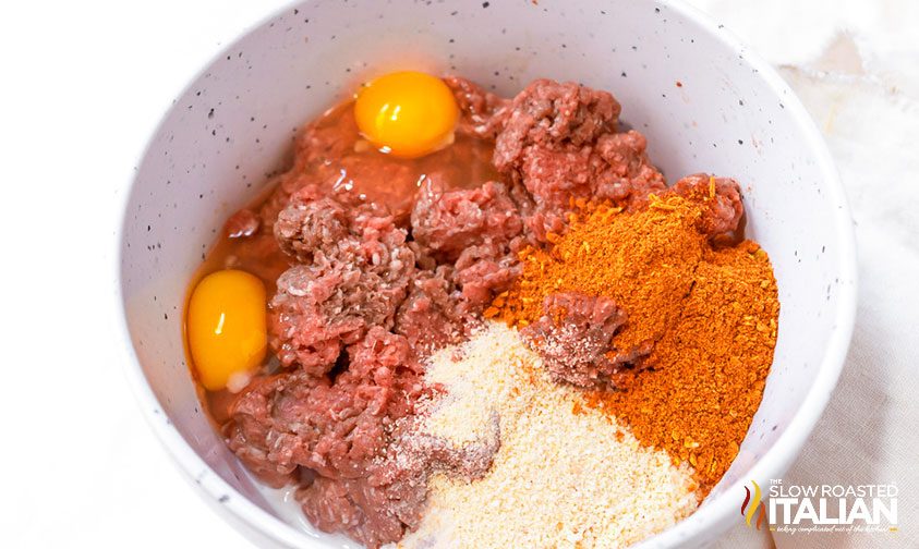mixing meatball ingredients