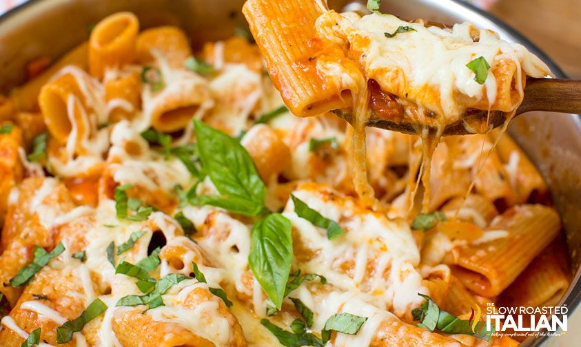 cheesy pasta in skillet close up