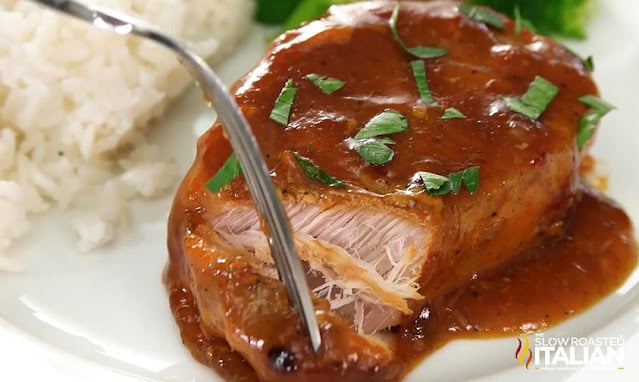 easy weeknight crockpot meals- boneless pork chop on plate with mashed potatoes