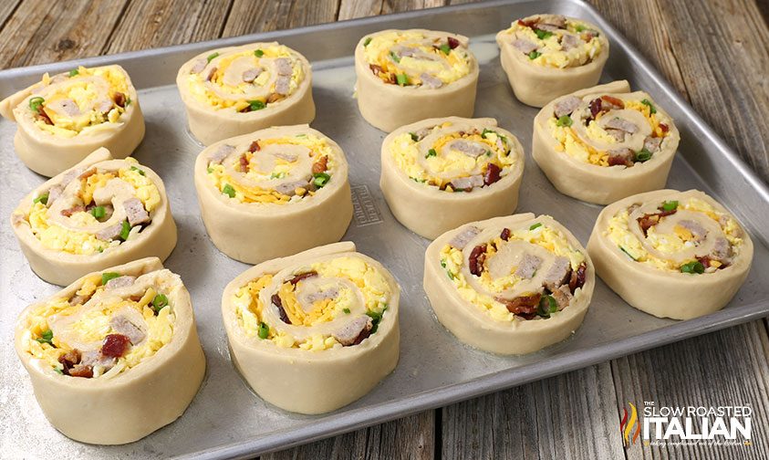 breakfast roll ups on baking sheet, before baking